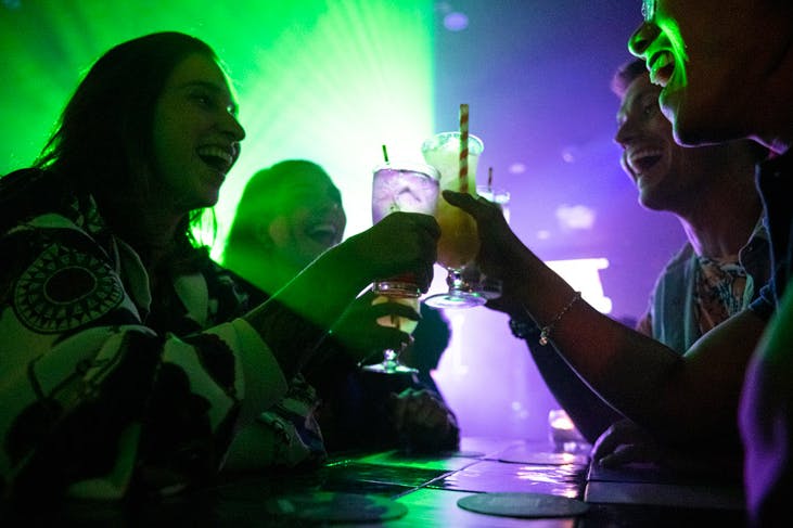 Friends cheers at Universal nightclub in Sydney
